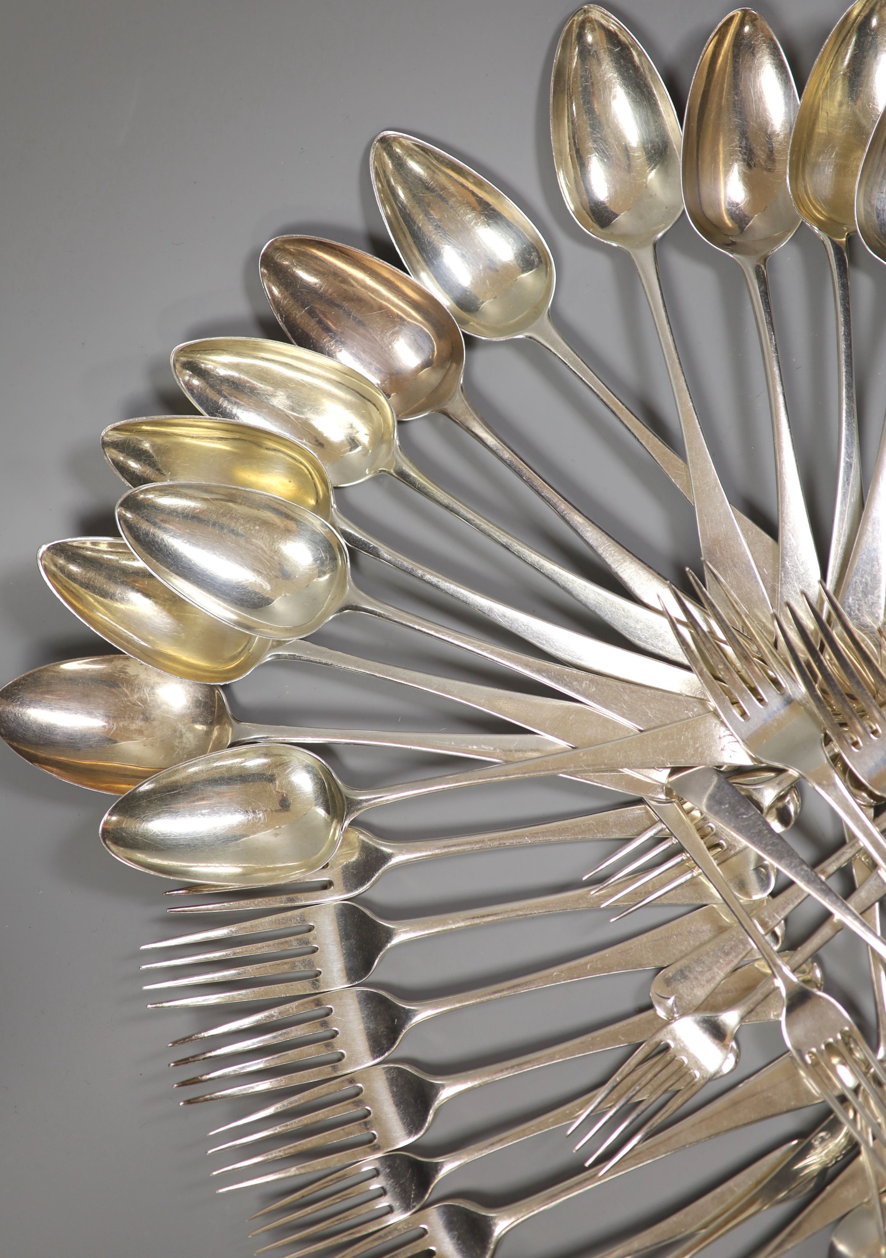 A matched part canteen of 19th century Old English pattern silver flatware, various dates and makers